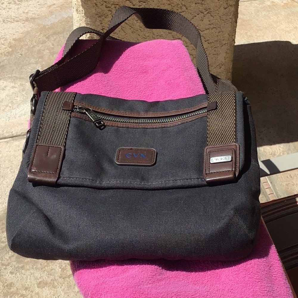 Tumi mini  messenger bag used